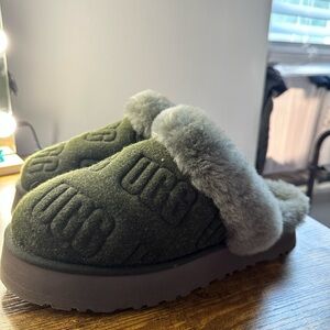 Selling gray, fluffy, Ugg slippers worn twice (not my style). Women’s size 9.